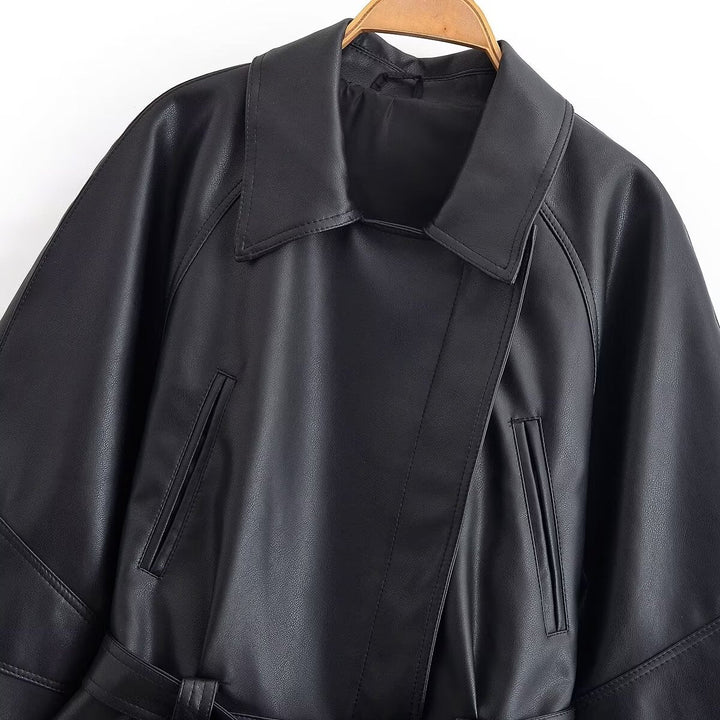Dam Kort Läderlook Blouson med Wrap Belt, Oversize Ärmar och Distinctive Dekorativ Seams