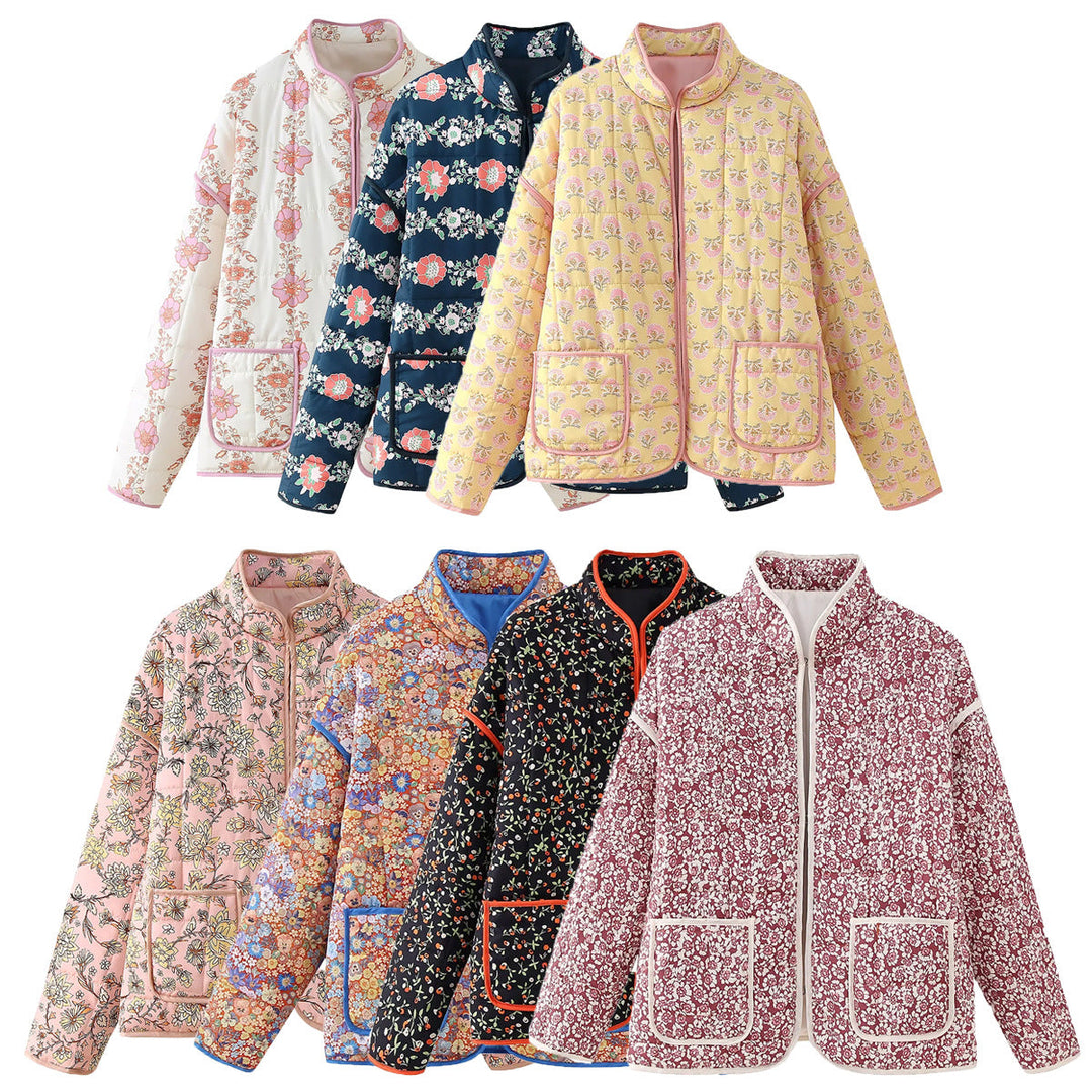 Dam quiltad floral jacka med ståkrage, dragkedja, och påsydda fickor