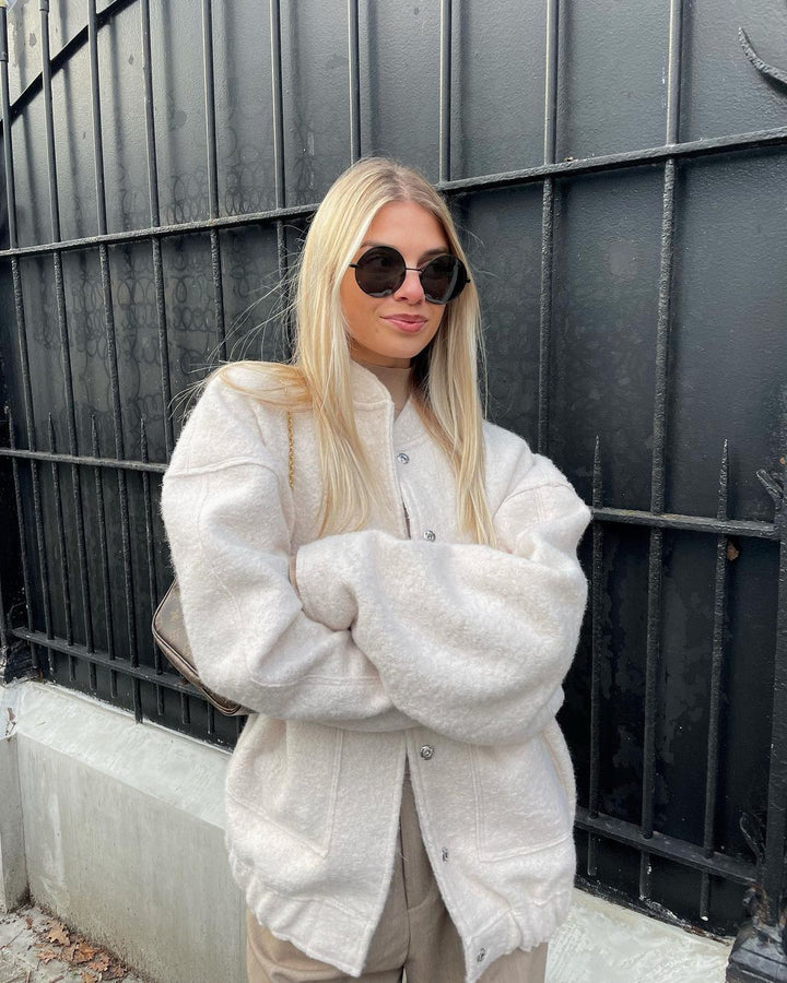 Dam mysig och elegant ulljacka