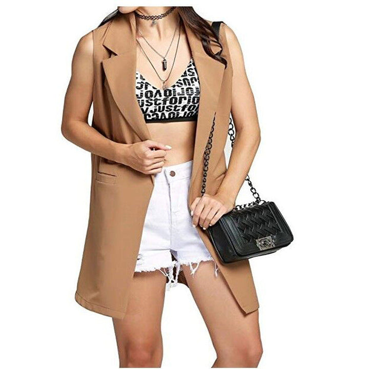 Dam lång waistcoat in tailoring look med shawl krage och sidofickor