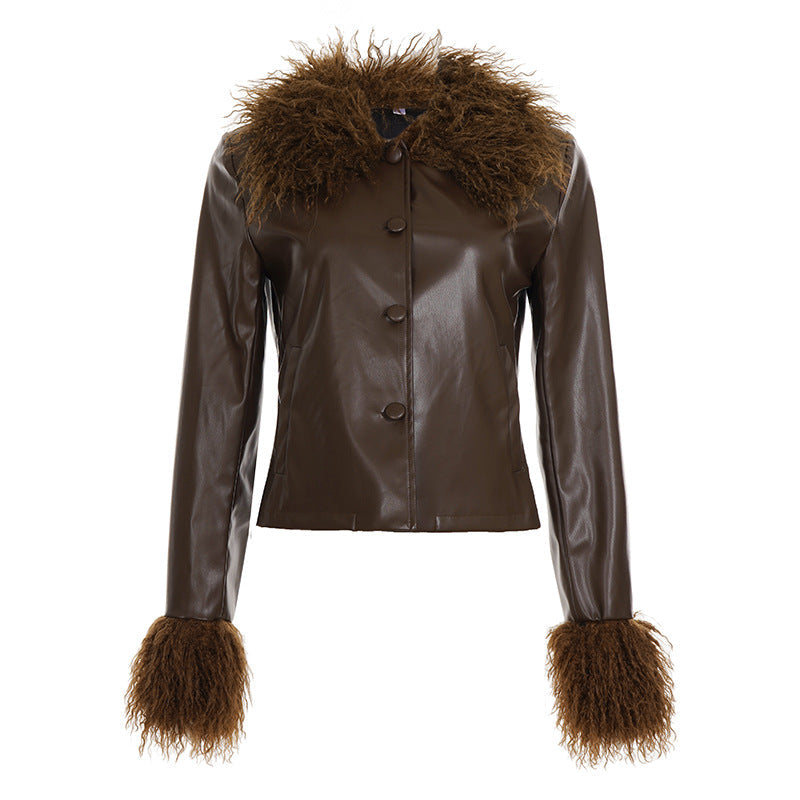 Dam kort konstläderjacka med voluminous pälskrage och fur cuffs