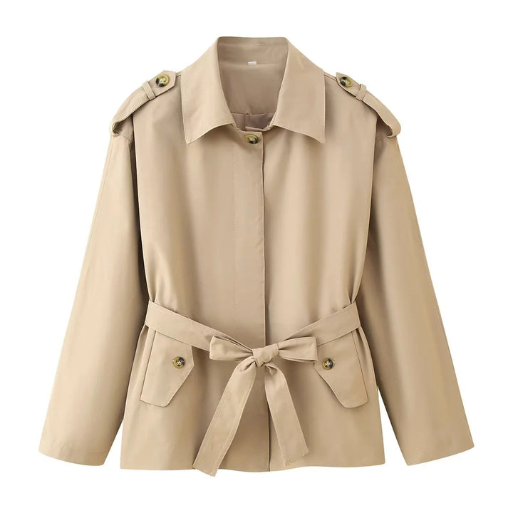 Dam figursydd kort trenchcoat med tie bälte, axel flaps och påsydda fickor