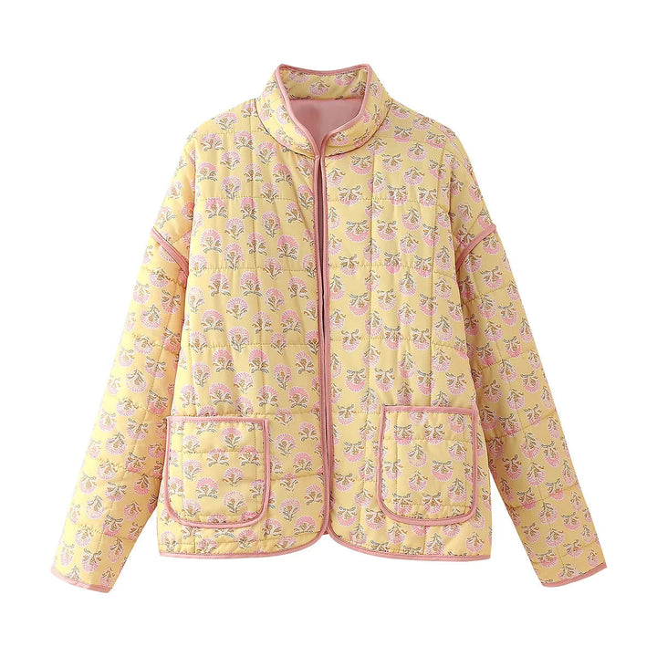 Dam quiltad floral jacka med ståkrage, dragkedja, och påsydda fickor
