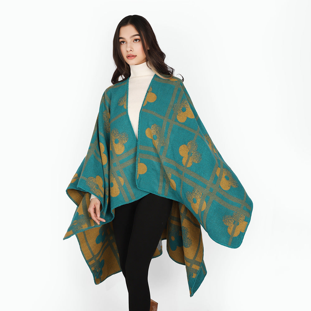 Dam Reversible Jacquard poncho tillverkad av ullblandning med floral check mönster och decorative piping seam