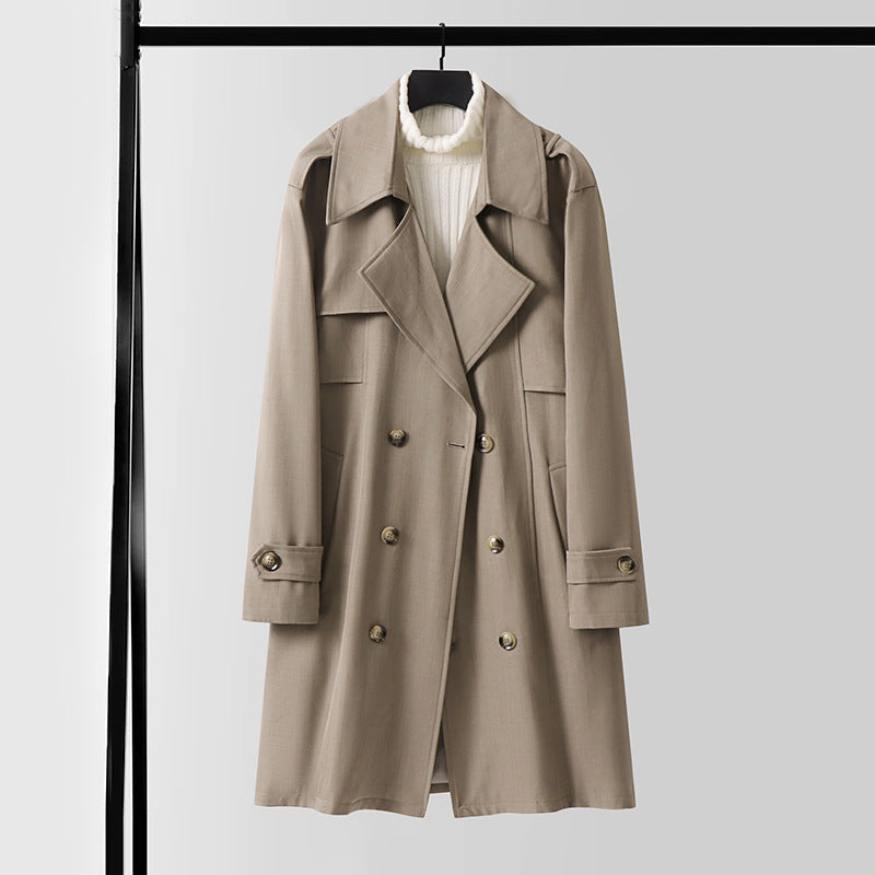 Dam Double-breasted kort trenchcoat gjord lätt ullblandning med a mjuk drape och shoulder flaps