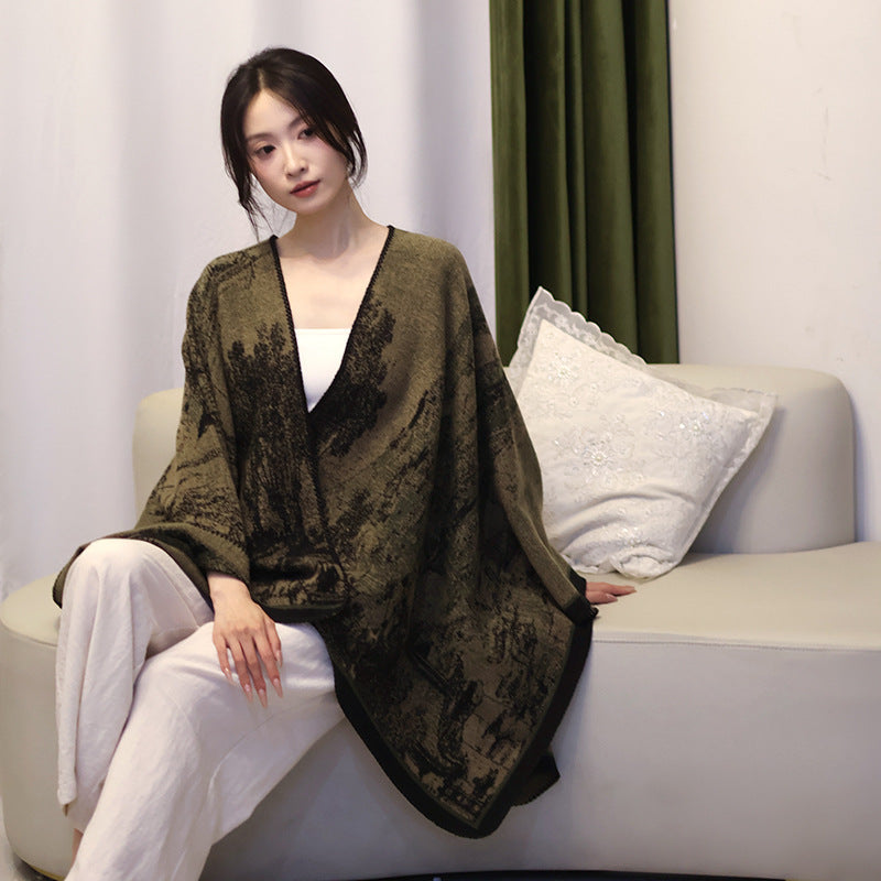 Dam jacquard stickad cape med textured woven look och öppen front