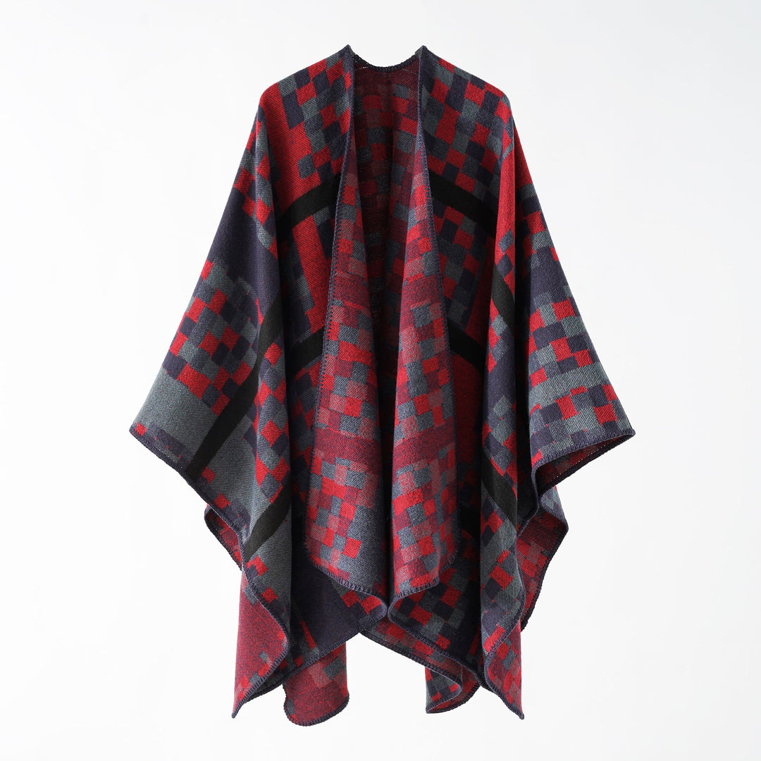 Dam Kastiger Web poncho med graphic jacquard och fringe edge