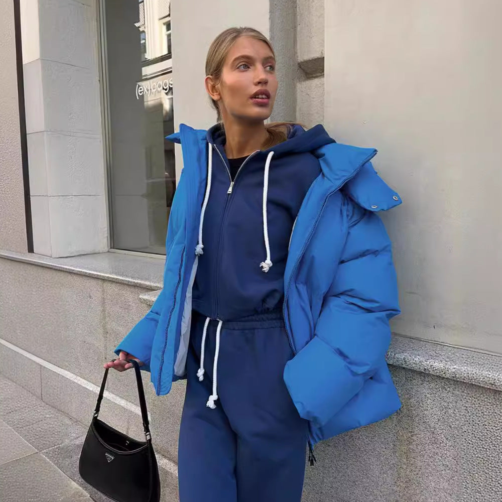 Dam oversize kviltad jacka med huva och vadderad värmande fyllning