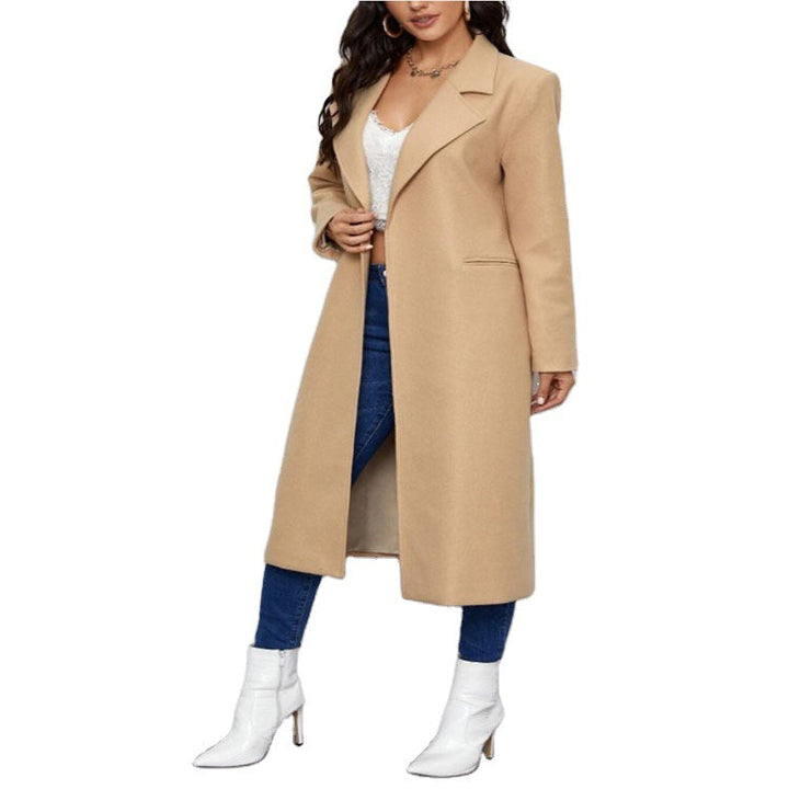 Dam Maxi Length Single Breasted kappa in minimalistisk Tailoring med dold knappslå och sidofickor