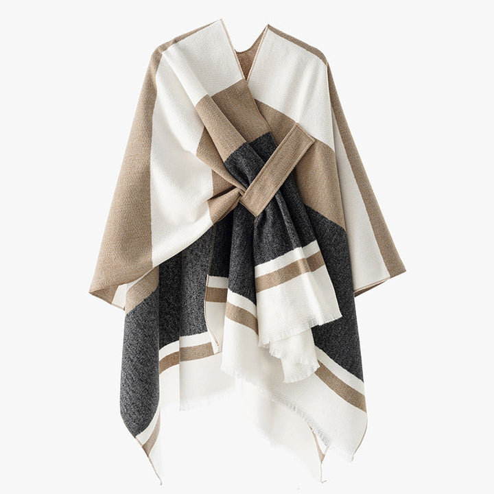 Dam oversized capeponcho tillverkad av ullblandning med tie loop och randig border