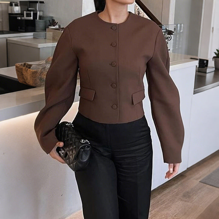 Dam oversized ulljacka med snap knäppning, boxy silhuett, och påsydda fickor