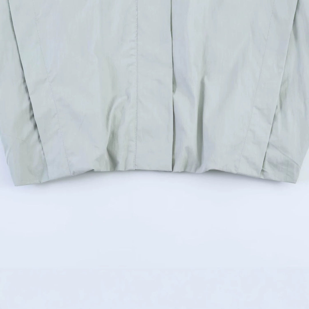 Dam Kort Windbreaker med Stå Krage, Oversize Ärmar och Dold Front