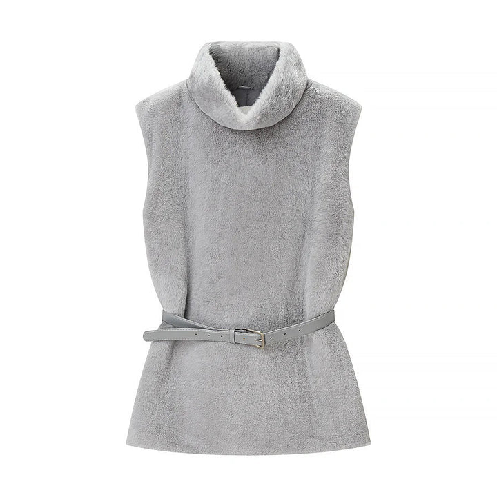 Dam sleeveless faux fur väst med high turtleneck och figursydd läder bälte