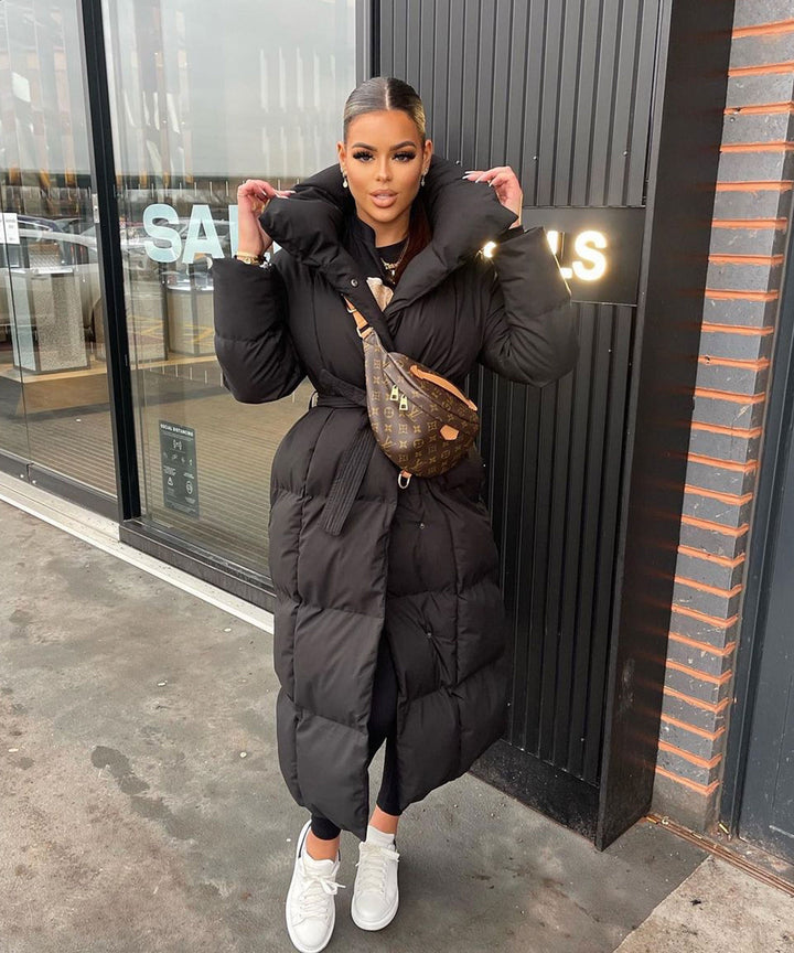 | Dam oversize Lång quiltad vinter parka
