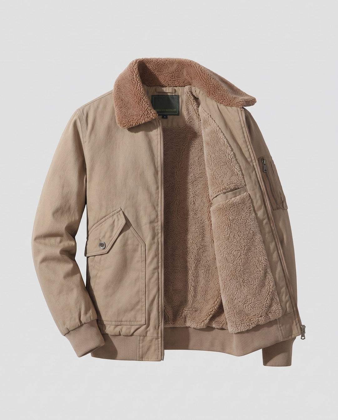 Herr canvas pilot jacka med continuous teddyfoder, funktion ärm ficka, och ribbad fåll