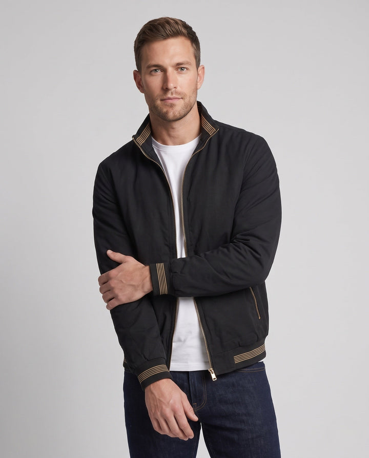 Herr teddy-lined canvas bomber med ståkrage, ribbade muddar, och sherpa foder
