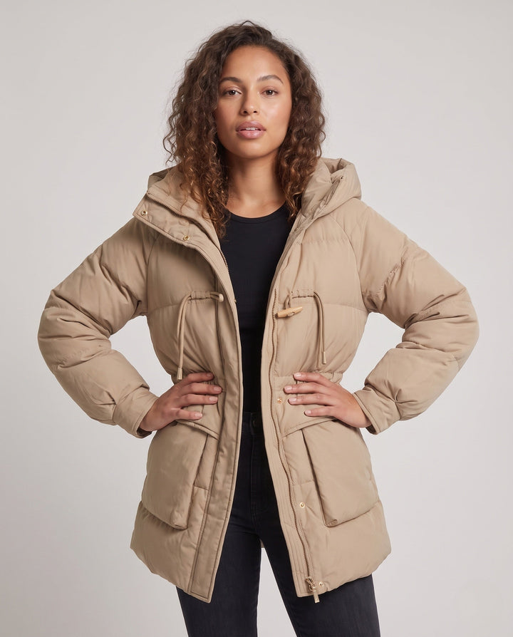 Dam Kort Oversize Vinter Parka med Voluminous Termisk Padding, Hög Stå Krage, och Extra Stora Lock Fickor