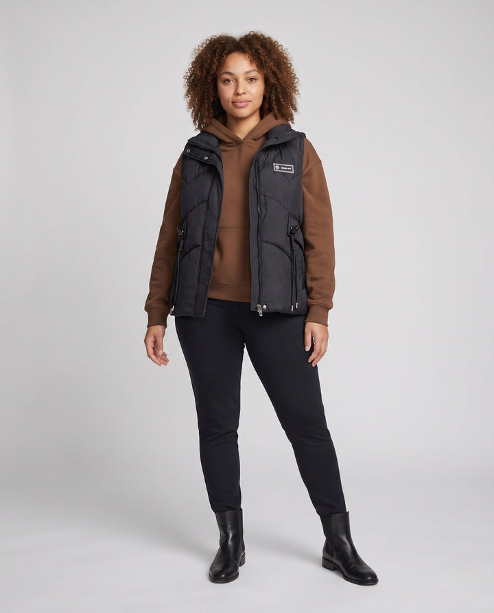 Dam Lätt Termisk Quiltad Väst med Integrated med Huva Inner Krage, Multifunctional Outer Fickor, och Justerbar Drawstring.