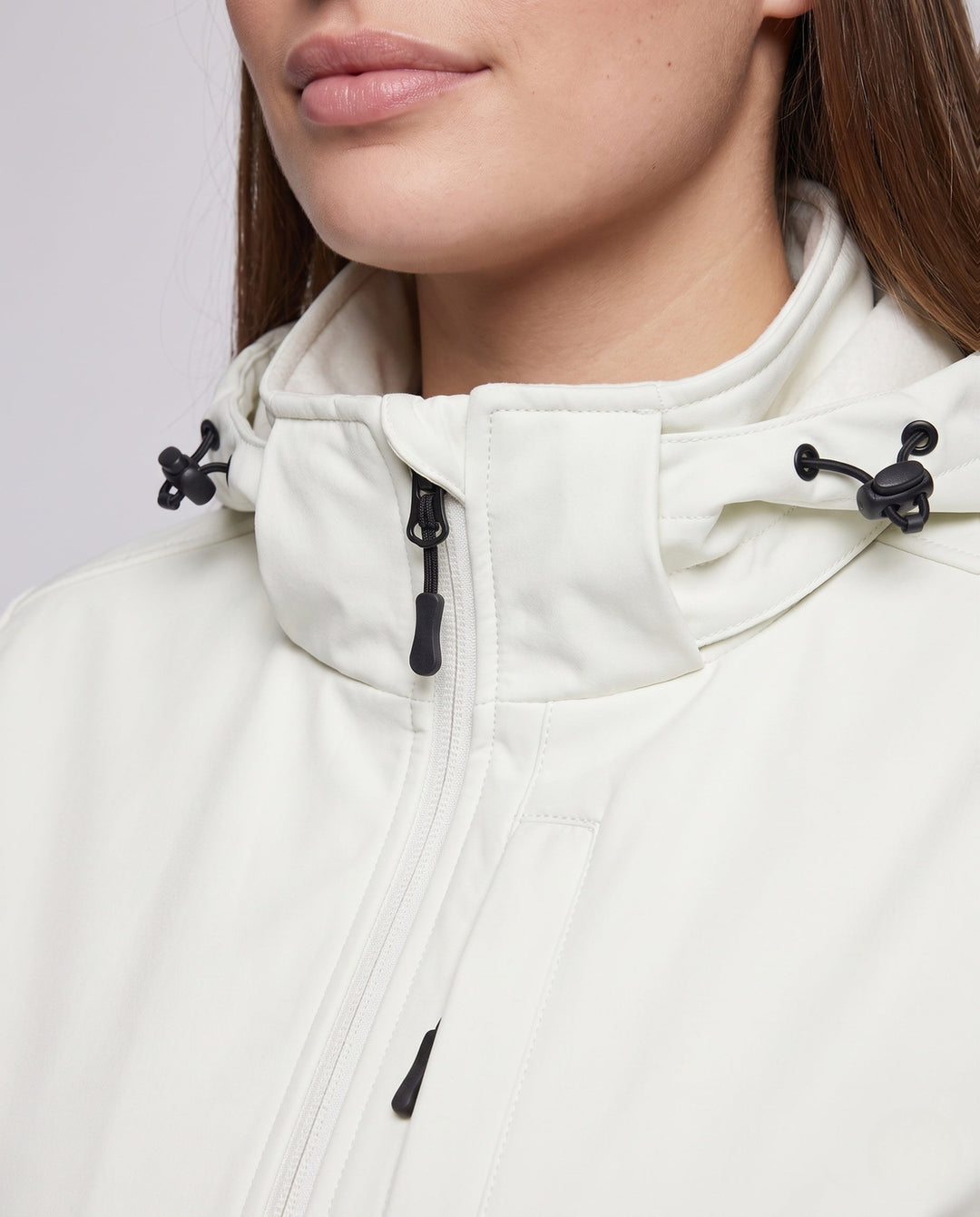 Dam två-layer softshelljacka med removable fleece inner layer och justerbar huva
