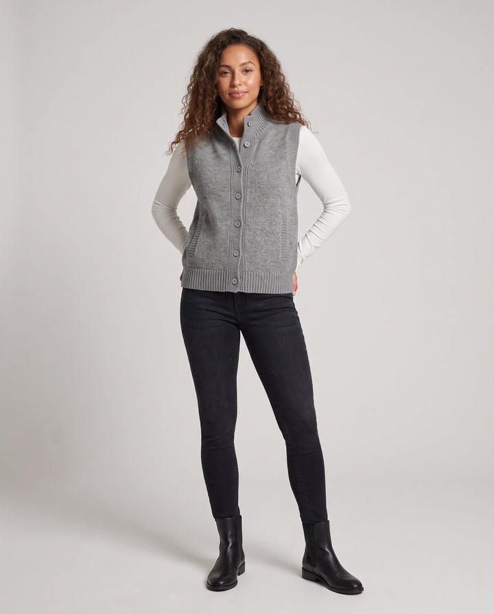 Dam ärmlös structured knit väst med hög ribbed krage, dold knappslå och inset fickor