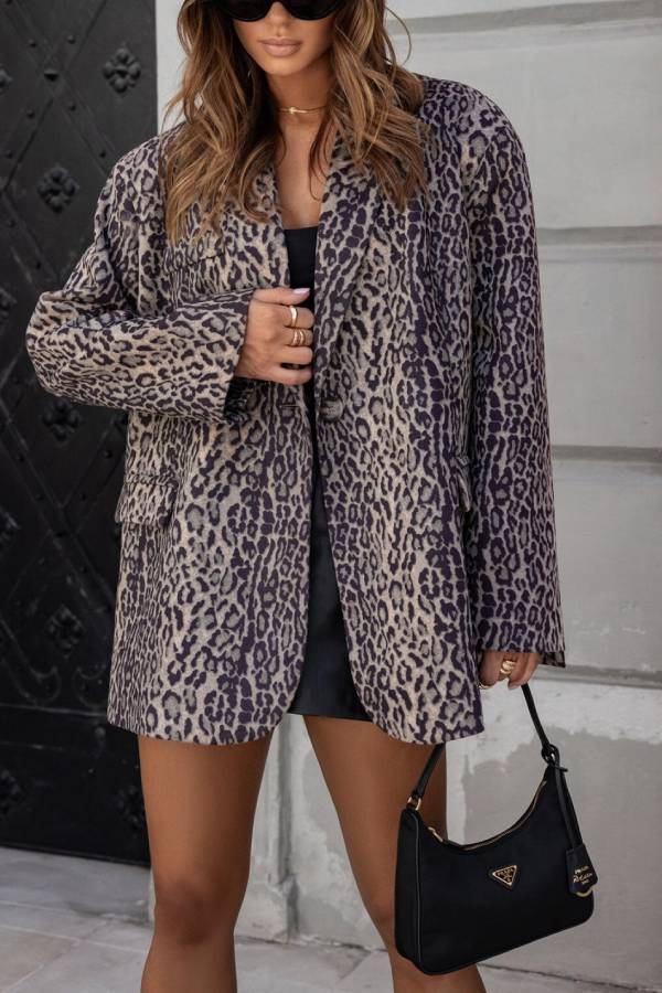 | Tryck Beige och Svart Jacka