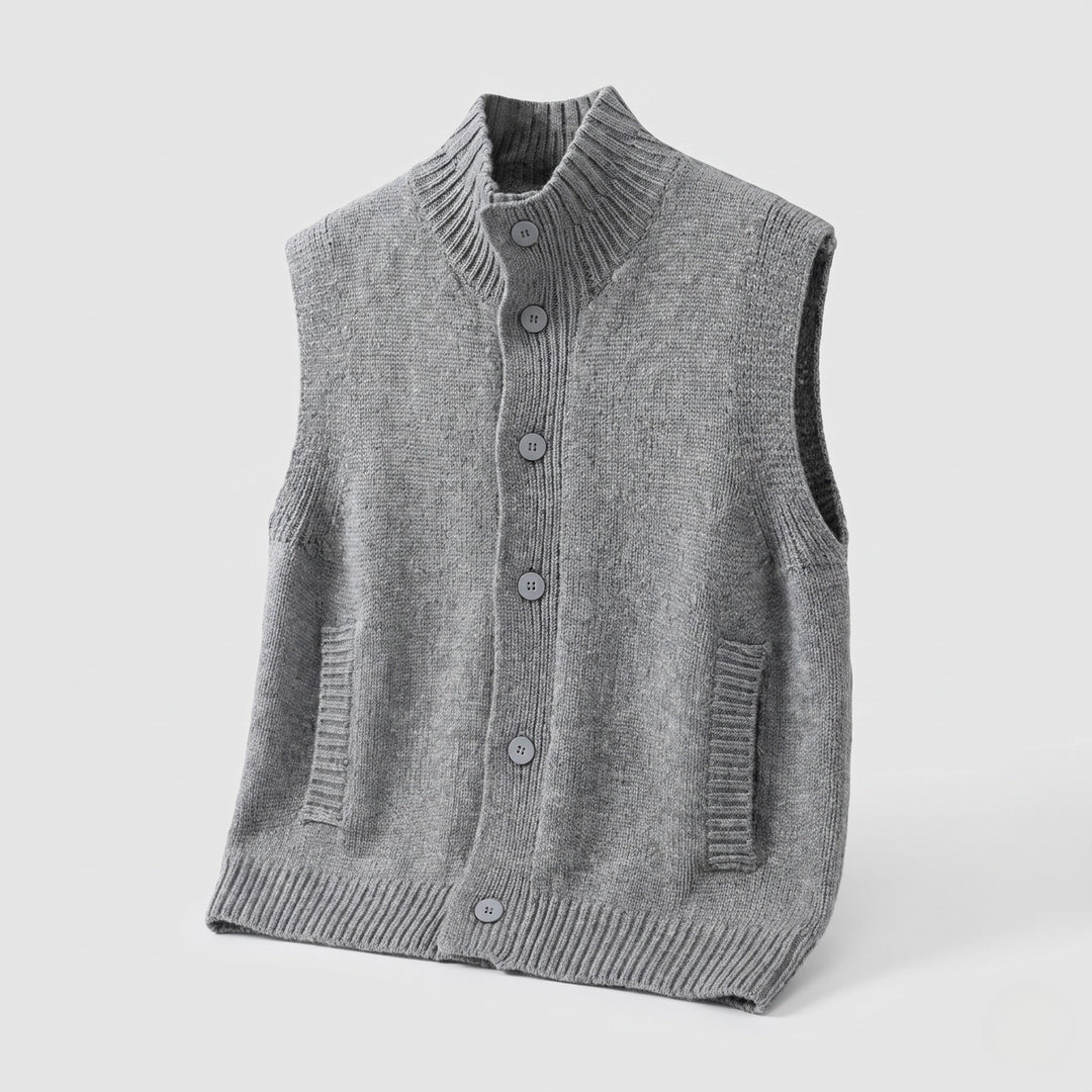 Dam ärmlös structured knit väst med hög ribbed krage, dold knappslå och inset fickor